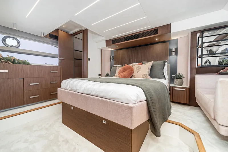  Yacht Photos Pics Luxurious 2024 Prestige X60 yacht bedroom with modern design and elegant decor.