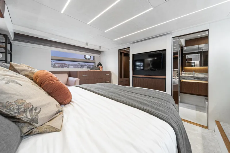  Yacht Photos Pics Luxurious bedroom interior of 2024 Prestige X60 yacht with modern design and elegant furnishings.