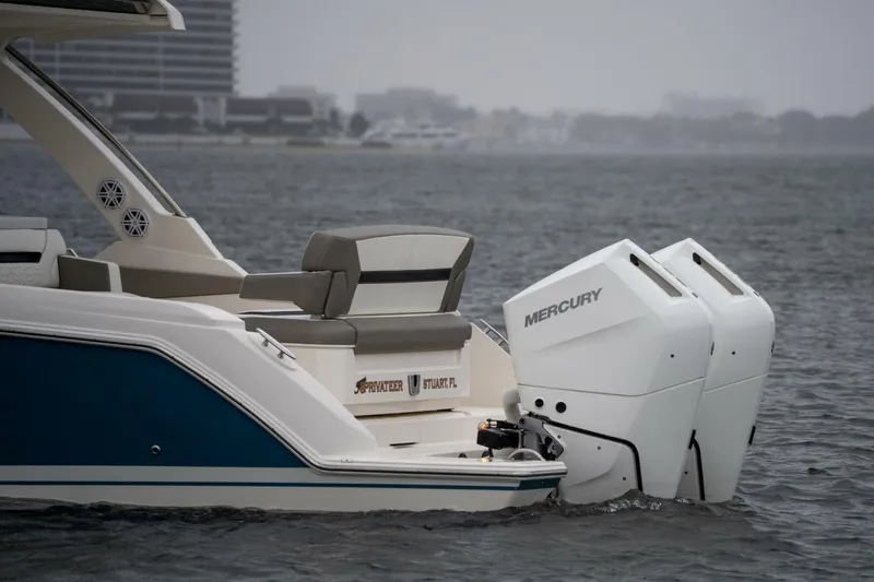  Yacht Photos Pics 2024 Tiara Sport 34 LS boat with dual Mercury outboard engines on water.