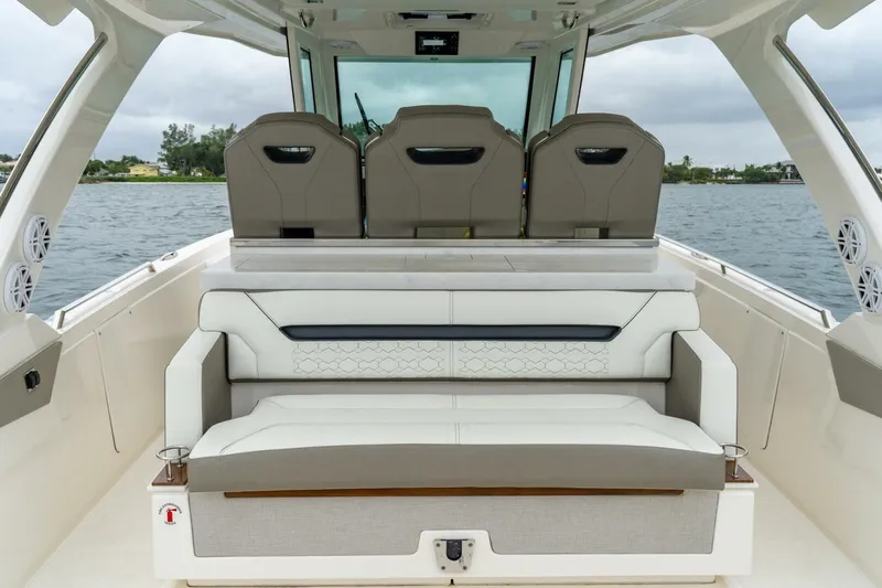  Yacht Photos Pics 2024 Tiara Sport 34 LS boat interior with luxurious seating and modern design.