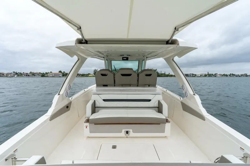  Yacht Photos Pics 2024 Tiara Sport 34 LS boat interior with seating, open water view.