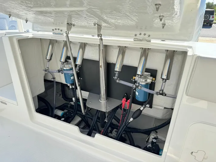  Yacht Photos Pics 2025 Sailfish 272 CC boat engine compartment with hydraulic systems and wiring.