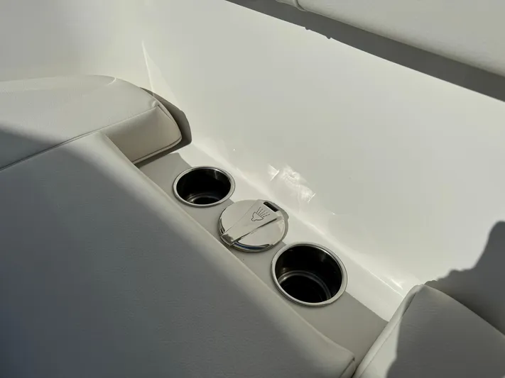  Yacht Photos Pics Sailfish 272 CC 2025 boat interior with cup holders and seating.