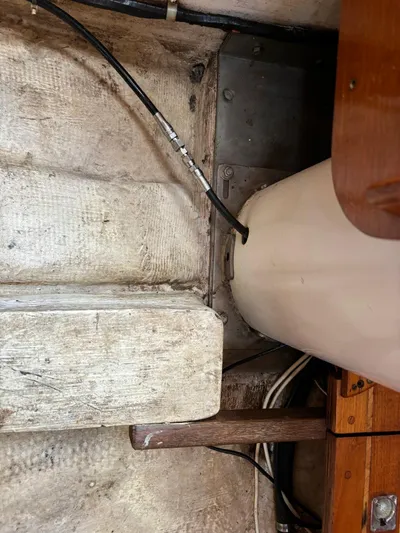 Colleen Yacht Photos Pics Interior view of a 1984 Cambria 44/46 sailboat showing wiring and structural details.