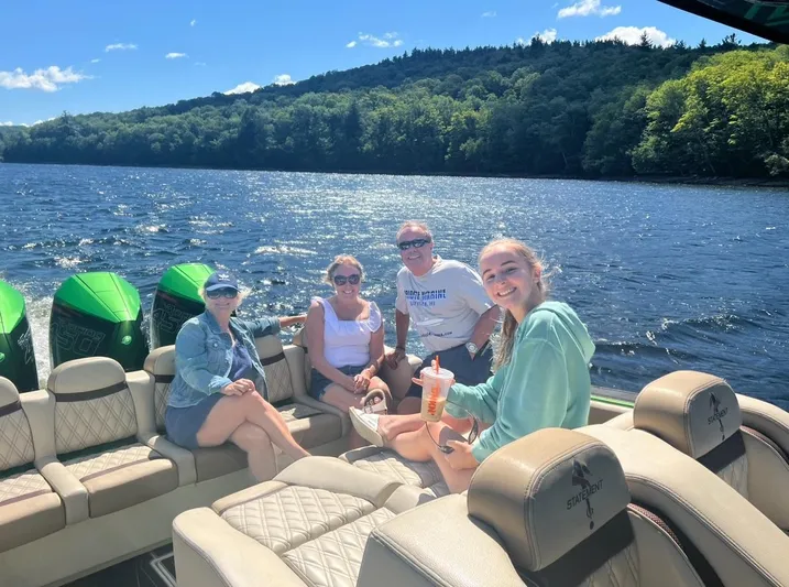  Yacht Photos Pics Group enjoying a sunny day on a 2018 Statement 380 Open boat.