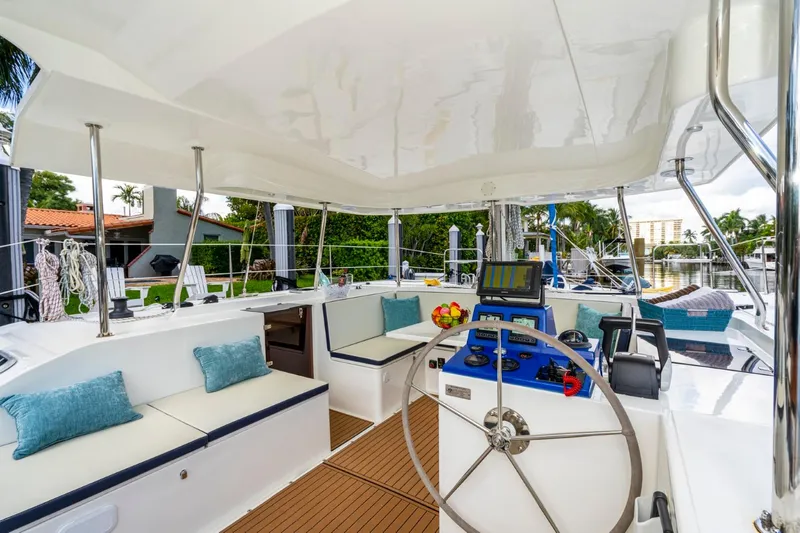  Yacht Photos Pics Luxurious 2025 Smart Cat S280 yacht interior with modern helm and comfortable seating.