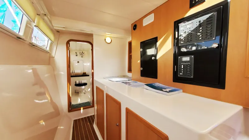  Yacht Photos Pics Interior of 2025 Smart Cat S280 yacht, featuring modern design and control panels.