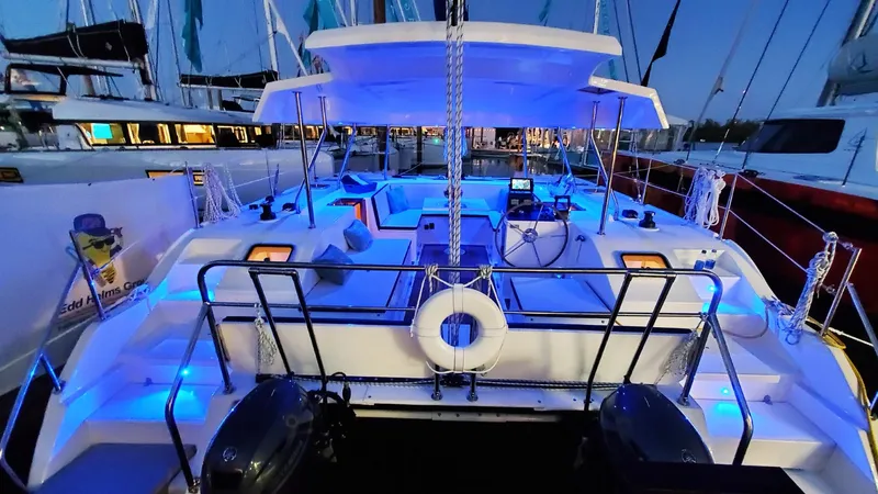  Yacht Photos Pics Modern Smart Cat S280 yacht with blue LED lights, spacious deck, and luxurious seating, 2025 model.