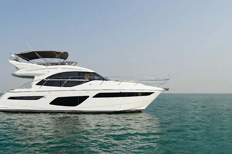 Princess F50 Model 2022 Yacht Photos Pics 2022 Princess F50 yacht cruising on calm blue waters.