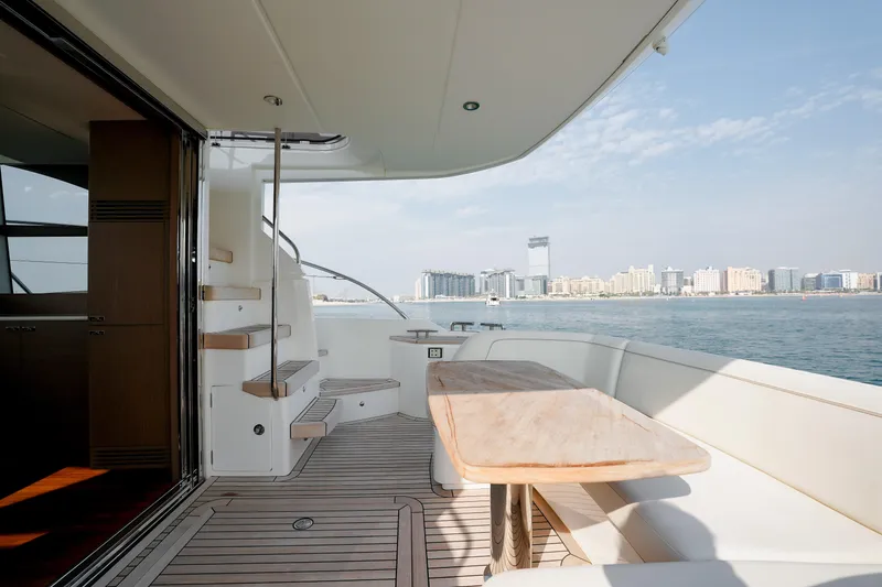 Princess F50 Model 2022 Yacht Photos Pics Luxurious 2022 Princess F50 yacht deck with city skyline view.