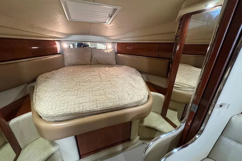The Judy Len Yacht Photos Pics Luxurious cabin interior of 2005 Sea Ray 360 Sundancer yacht with cozy bed.