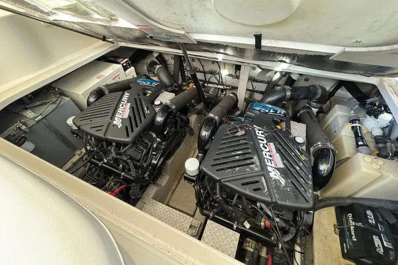 The Judy Len Yacht Photos Pics Engine compartment of a 2005 Sea Ray 360 Sundancer with twin Mercury engines.
