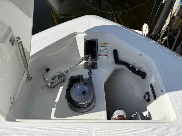  Yacht Photos Pics 2020 Boston Whaler 330 Outrage anchor compartment with rope and winch.