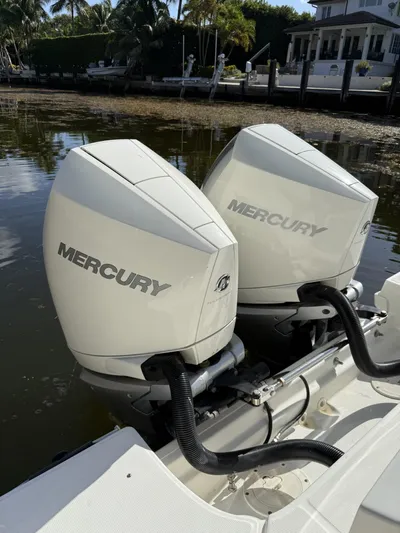  Yacht Photos Pics Twin Mercury outboard engines on a 2020 Boston Whaler 330 Outrage boat.
