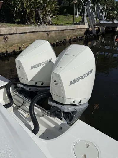  Yacht Photos Pics Twin Mercury outboard engines on a 2020 Boston Whaler 330 Outrage boat.