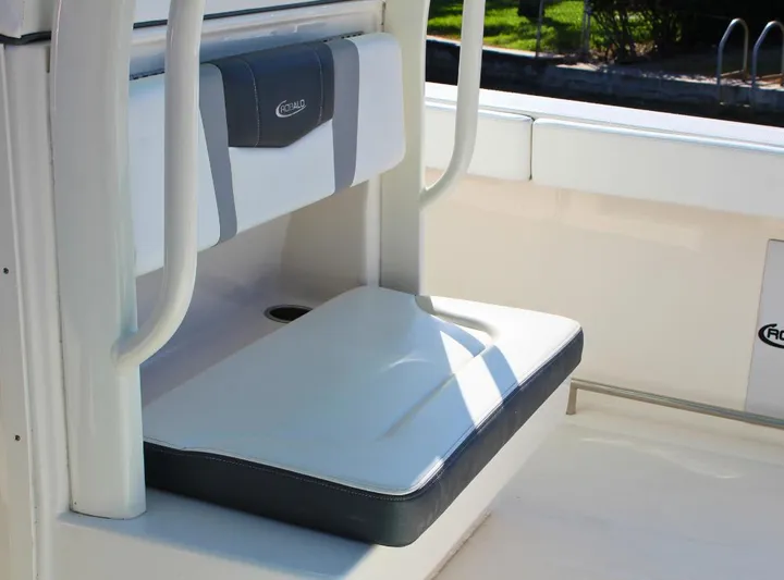  Yacht Photos Pics 2021 Robalo 272 boat seat with white and gray cushion.