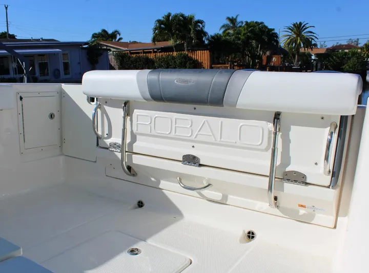  Yacht Photos Pics 2021 Robalo 272 boat interior with foldable seating and storage.
