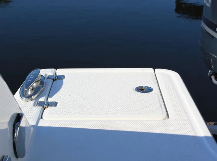  Yacht Photos Pics Robalo 272 boat deck detail, 2021 model, with water in the background.