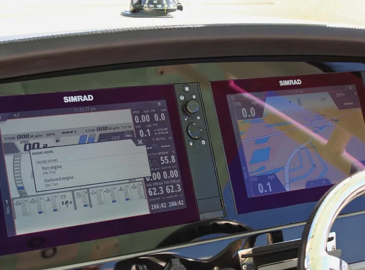  Yacht Photos Pics Simrad navigation displays on 2021 Robalo 272 boat dashboard.