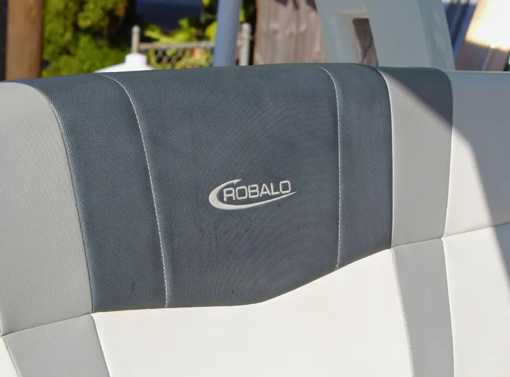  Yacht Photos Pics Robalo 272 boat seat, 2021 model, featuring gray and white upholstery.
