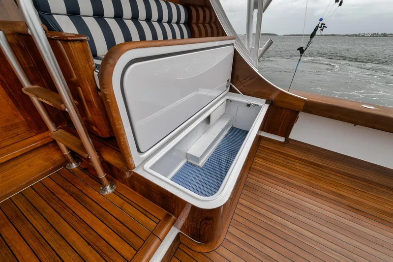  Yacht Photos Pics Luxurious 2011 Jim Smith Custom Sportfish boat with elegant wood deck and built-in storage.