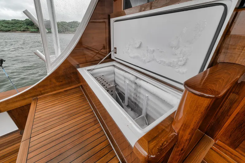  Yacht Photos Pics Open freezer on 2011 Jim Smith Custom Sportfish boat with wooden deck.