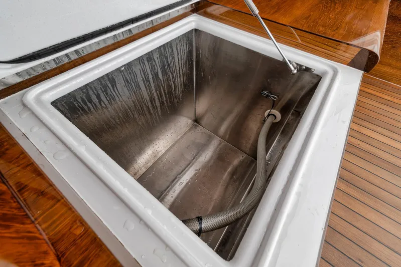 Yacht Photos Pics Stainless steel storage compartment on 2011 Jim Smith Custom Sportfish boat.