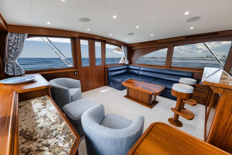  Yacht Photos Pics Luxurious 2011 Jim Smith Custom Sportfish yacht interior with elegant wood finishes and ocean view.