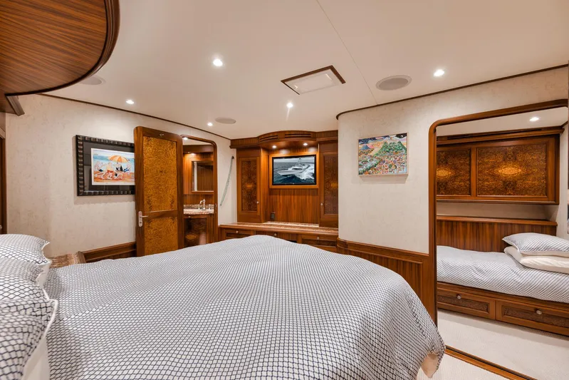  Yacht Photos Pics Luxurious cabin interior of 2011 Jim Smith Custom Sportfish yacht with elegant wood finishes.