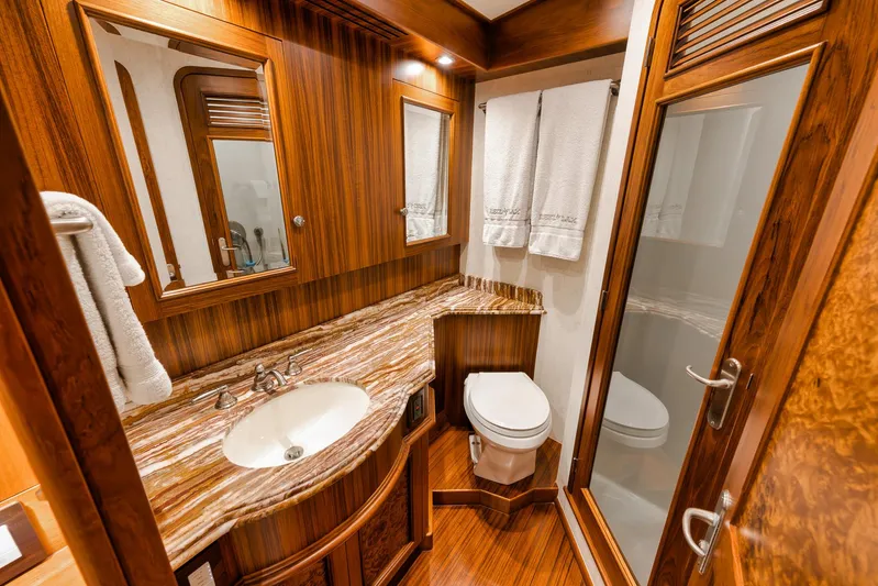  Yacht Photos Pics Luxurious bathroom in 2011 Jim Smith Custom Sportfish yacht with wood accents and modern fixtures.