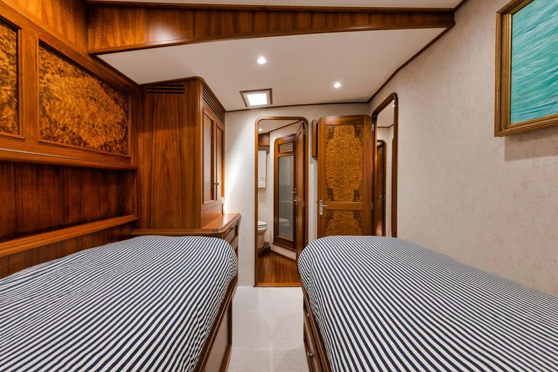  Yacht Photos Pics Luxurious 2011 Jim Smith Custom Sportfish cabin with twin beds and elegant wood finishes.