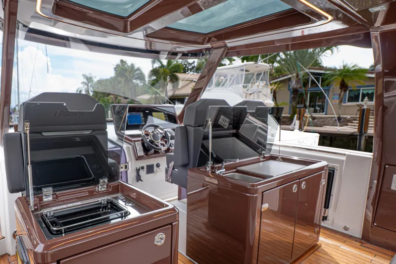  Yacht Photos Pics 2024 Fjord 41 XP yacht interior with modern helm and sleek design features.