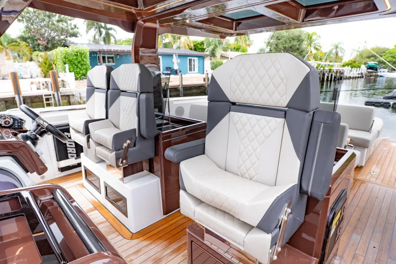  Yacht Photos Pics Luxurious seating on 2024 Fjord 41 XP yacht with elegant design and waterfront view.