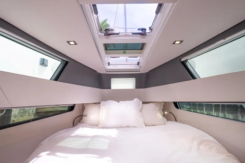  Yacht Photos Pics Luxurious interior cabin of 2024 Fjord 41 XP yacht with skylight and modern design.