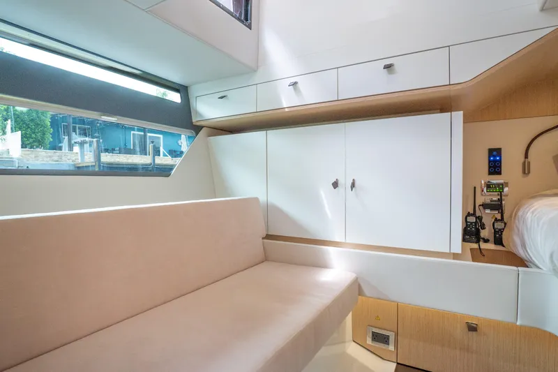  Yacht Photos Pics 2024 Fjord 41 XP yacht interior with modern seating and sleek cabinetry design.