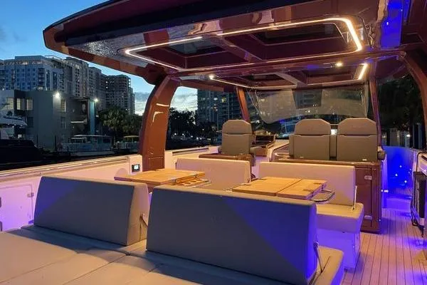  Yacht Photos Pics Luxurious 2024 Fjord 41 XP yacht interior with modern seating and ambient lighting.