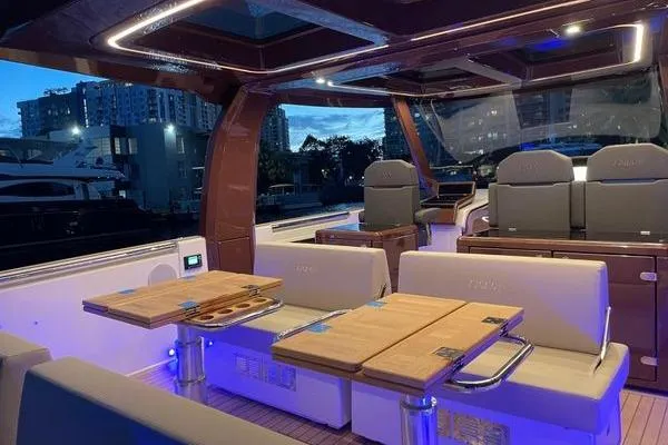  Yacht Photos Pics Luxurious 2024 Fjord 41 XP yacht interior with modern seating and ambient lighting.