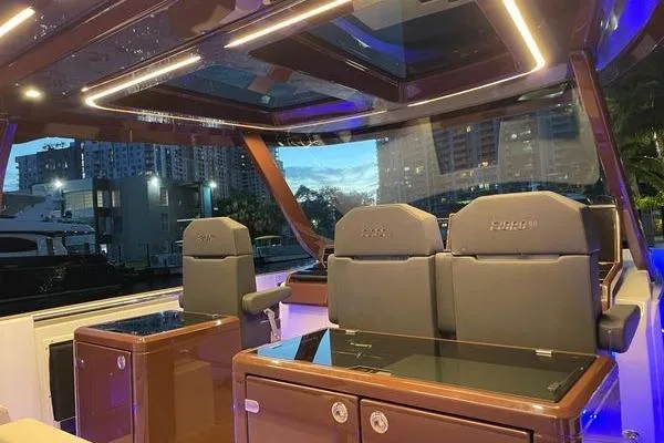  Yacht Photos Pics Luxurious interior of 2024 Fjord 41 XP yacht with modern seating and ambient lighting.