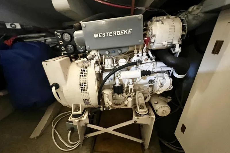 Clark Mills Yacht Photos Pics Engine room of 1972 Mills Boat Works Tug Boat with Westerbeke generator.