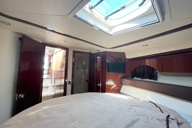  Yacht Photos Pics Luxurious interior of 2012 Meridian 441 Sedan yacht with skylight and modern amenities.