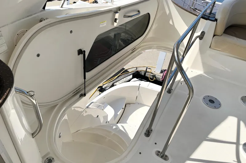  Yacht Photos Pics 2012 Meridian 441 Sedan yacht interior with open hatch and stainless steel railings.