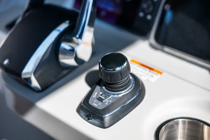  Yacht Photos Pics Control panel of 2022 Boston Whaler 330 Outrage boat, featuring joystick and throttle.