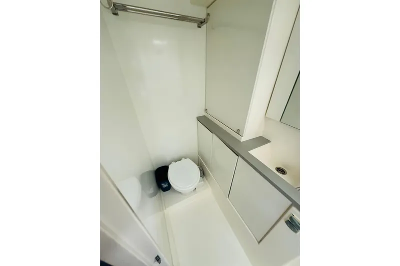 Stargazer Yacht Photos Pics 2017 Robertson and Caine Leopard yacht bathroom with modern fixtures and compact design.