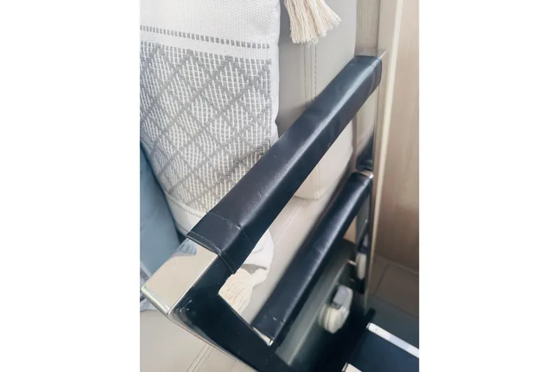 Stargazer Yacht Photos Pics Interior detail of 2017 Robertson and Caine Leopard yacht with modern railing and cushion.