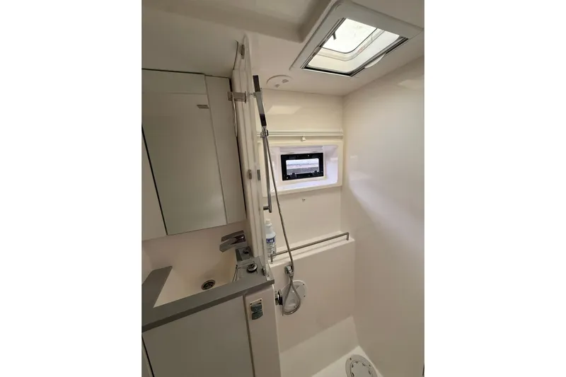 Stargazer Yacht Photos Pics 2017 Robertson and Caine Leopard yacht bathroom with shower and skylight.