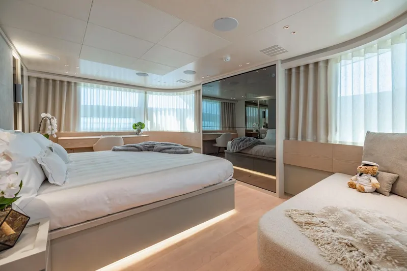Legacy Yacht Photos Pics Luxurious Sanlorenzo SD96 2022 yacht bedroom with modern decor and natural light.