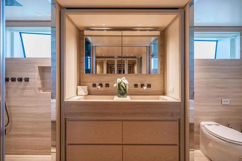 Legacy Yacht Photos Pics Luxurious bathroom interior of 2022 Sanlorenzo SD96 yacht with modern fixtures and elegant design.