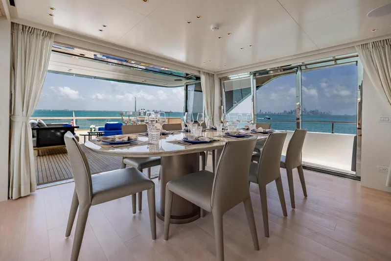 Legacy Yacht Photos Pics Luxurious dining area on 2022 Sanlorenzo SD96 yacht with ocean view.