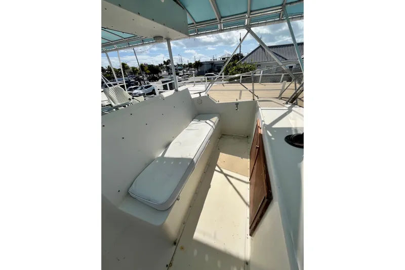  Yacht Photos Pics 1978 Hatteras 53 Yacht Fisherman deck with seating and canopy.