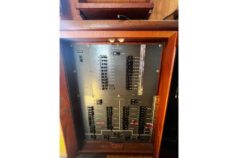  Yacht Photos Pics Electrical panel of a 1978 Hatteras 53 Yacht Fisherman, featuring circuit breakers.